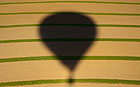 Balloon shadow on a field
